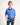 Young boy wearing a blue workshirt and jeans on a white background