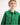 Boy wearing a green workshirt with a plain background