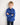 Young boy wearing a dark blue workshirt with a white background