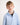 Young boy wearing a light blue quarter-zip sweatshirt on a white background