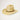 Straw hat with a leather band on a light gray background