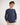 Boy wearing a navy long-sleeve shirt against a white background