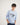 Boy wearing a light blue sweatshirt on a white background